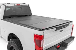 Rough Country - Hard Tri-Fold Flip Up Bed Cover 6 Foot 10 Inch Bed Ford F-250/F-350 Super Duty (17-26) Rough Country - Image 1